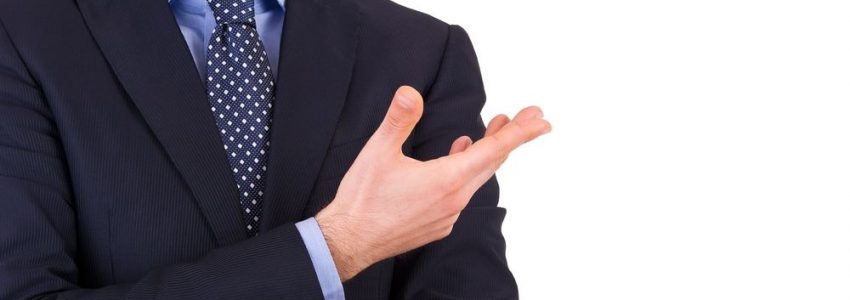 18929253 - businessman gesturing with hand 18929253 - businessman gesturing with hand