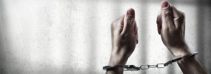 41378365 - arrest man handcuffed in cell prison 41378365 - arrest man handcuffed in cell prison
